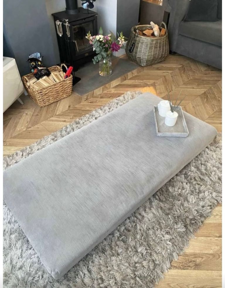 Large modern grey footstool