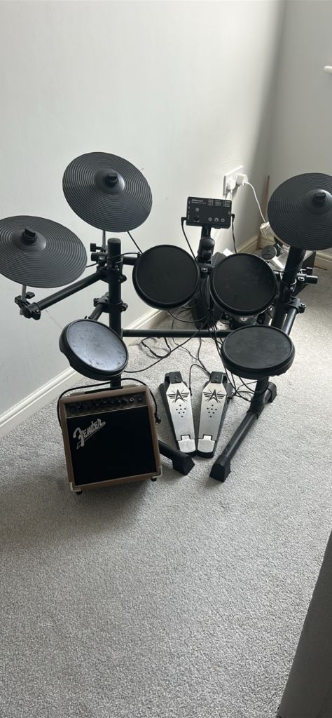 Electronic Drum Kit with Fender Amp – Good Condition