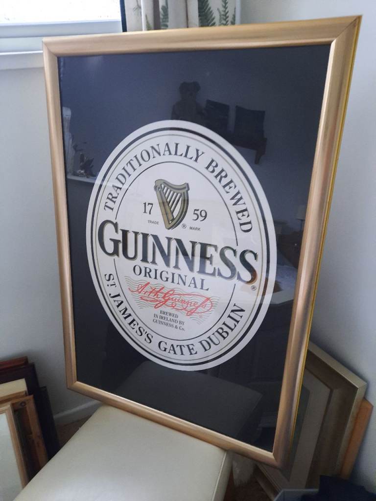 Large glazed Guinness picture with gold gilted frame 