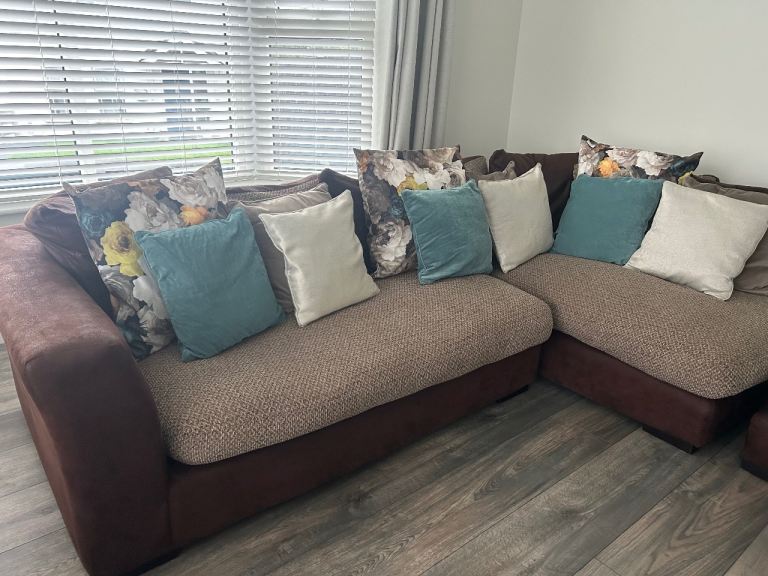 Large L-shaped corner sofa with large square footstool and Swivel Chair 