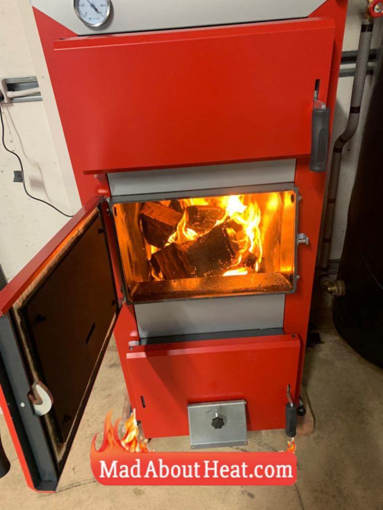 Solid fuel boiler, cut heating costs and burn logs, many in stock