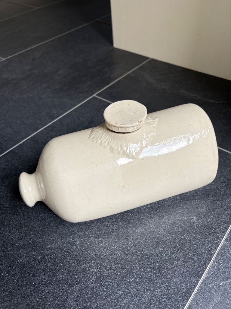 Ceramic hot water bottle / doorstop