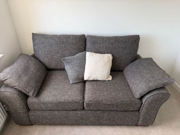 Next 2x 2 seater sofa with storage foot stool. Excellent Condition 