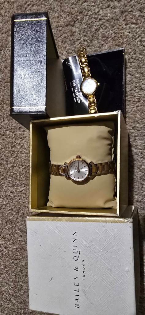 Stainless steel gold tone womas watches x2
