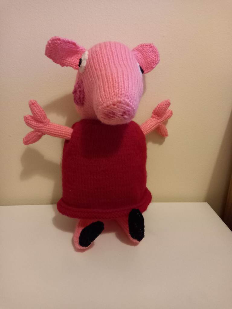 Hand knitted peppa pig