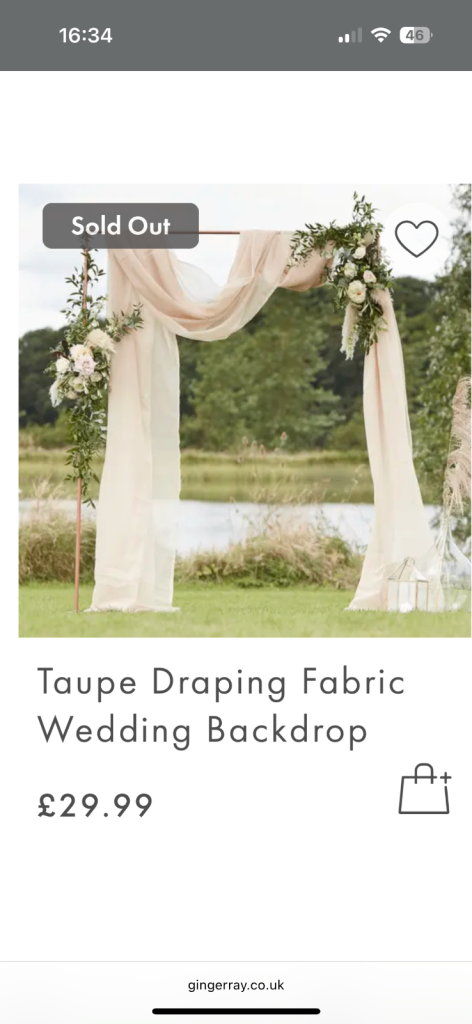 Ginger Ray Wedding arch with wedding fabric backdrop 