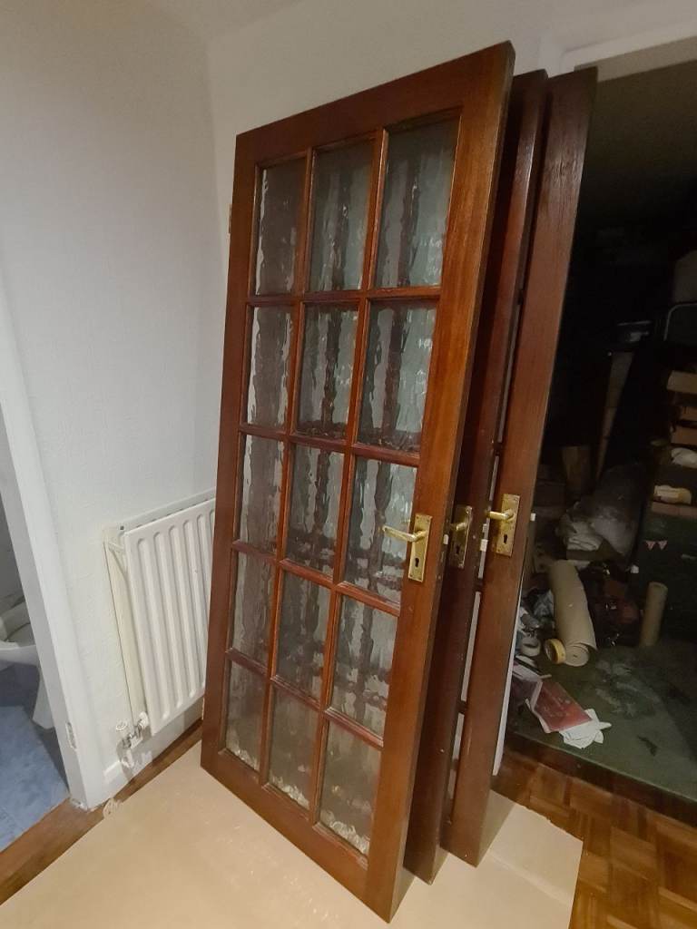 4 Wooden internal doors with glass panels. Nominally 78" x 30" 