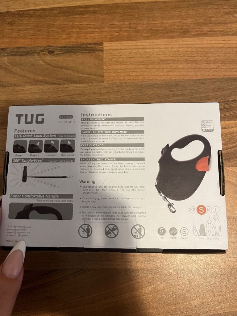 Tug extendable dog lead 
