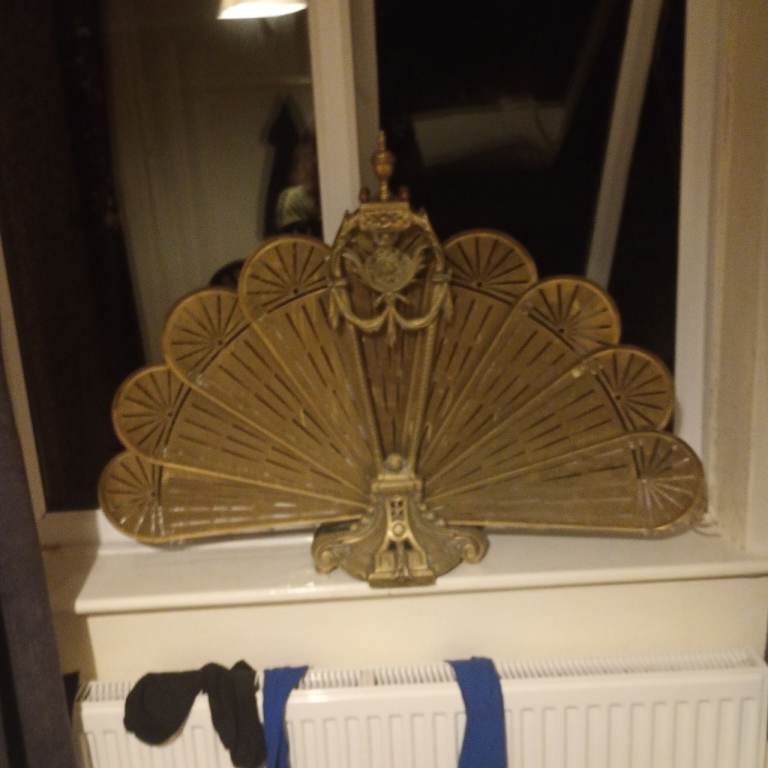 Antique fireguard brass