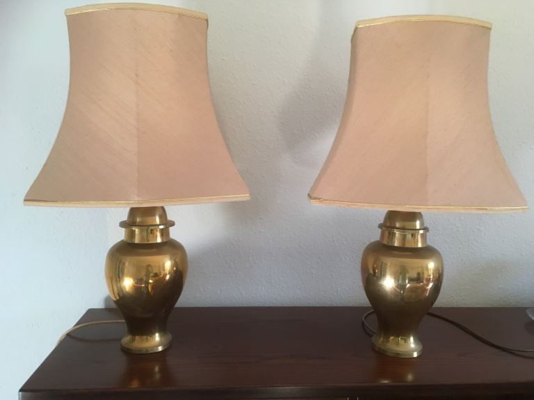 Pair of brass lamps with shades 