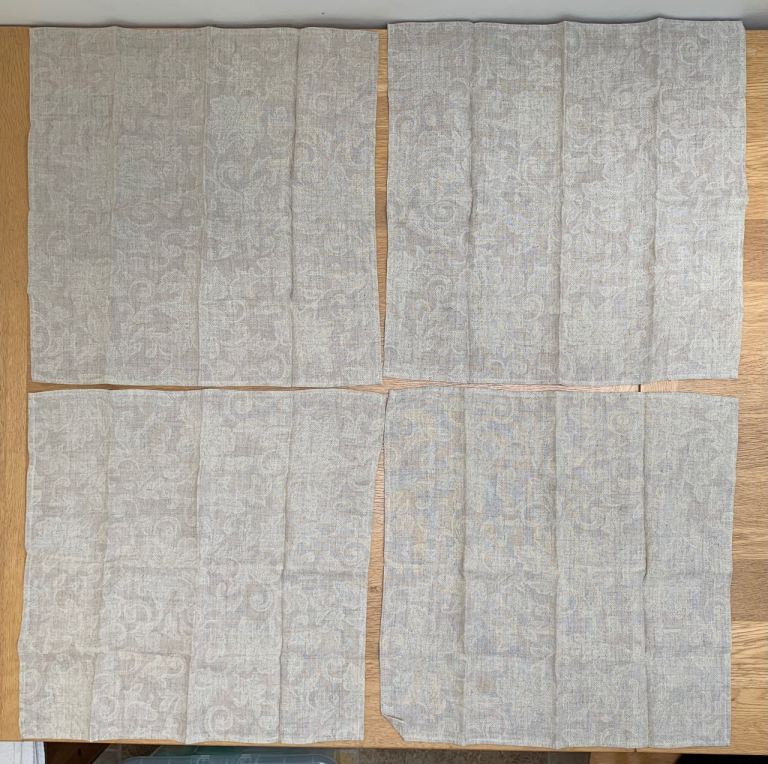 Four John Lewis napkins