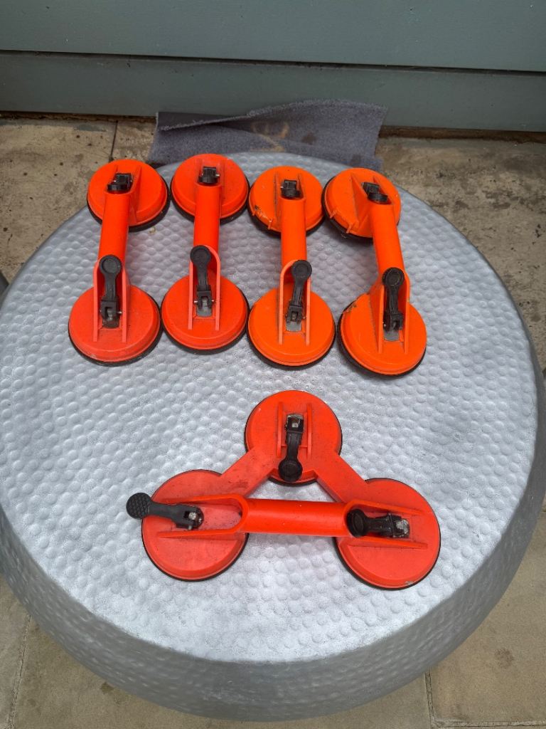 Glass suction handles