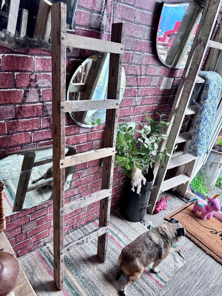 A straight Vintage wooden step ladder,towel rail/shelving