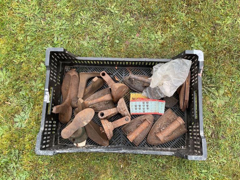 Box of Mostly Vintage Cast Iron Items - To Include 7 Flat Irons and Shoe Related Items