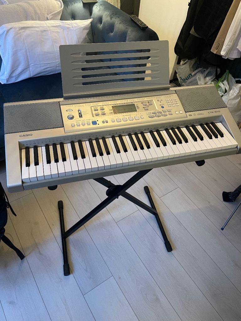 Casio CTK-810 61-Key Digital Keyboard with Stand