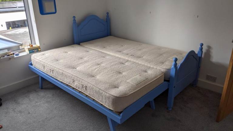 Single bed and under bed and 2 clean quality sprung mattresses 