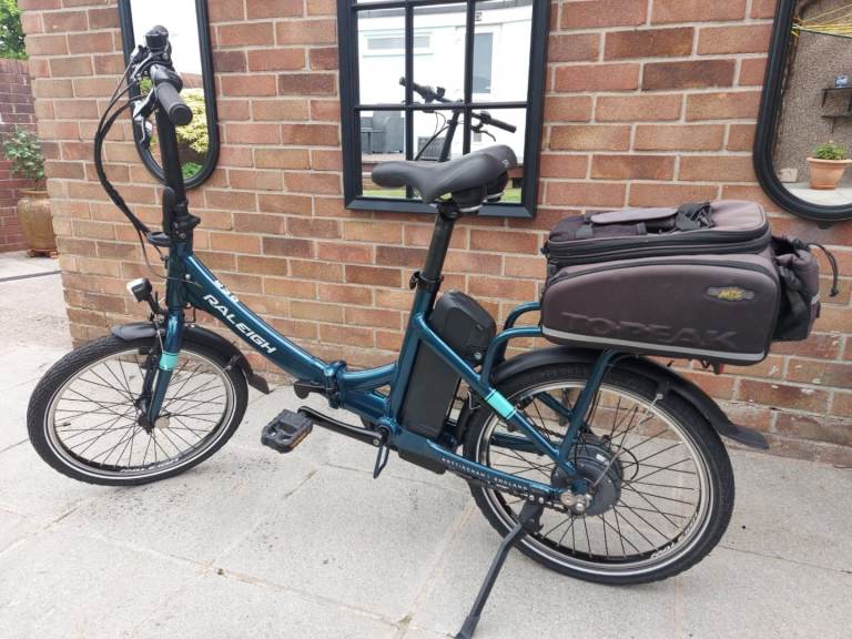 Raleigh evo folding electric bike like new