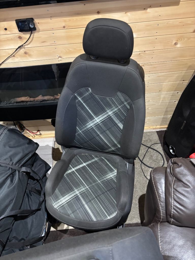Vauxhall Corsa e front seats and rear seat cover headrest ect 
