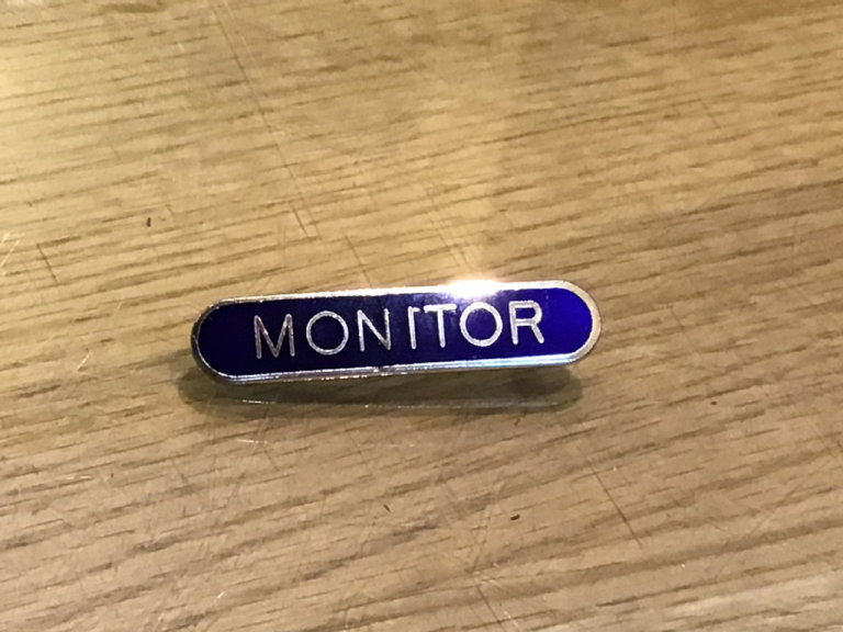 Vintage Blue Enamel and Gilt Metal Monitor Lapel Badge