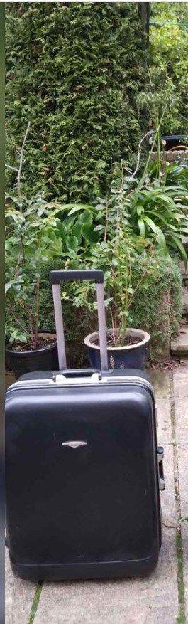 Suitcase, by Zebra, hard shell, combination lock and key, on wheels, vgc