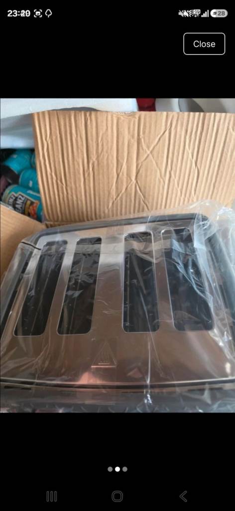 New Silver 4-Slice Toaster in Box
