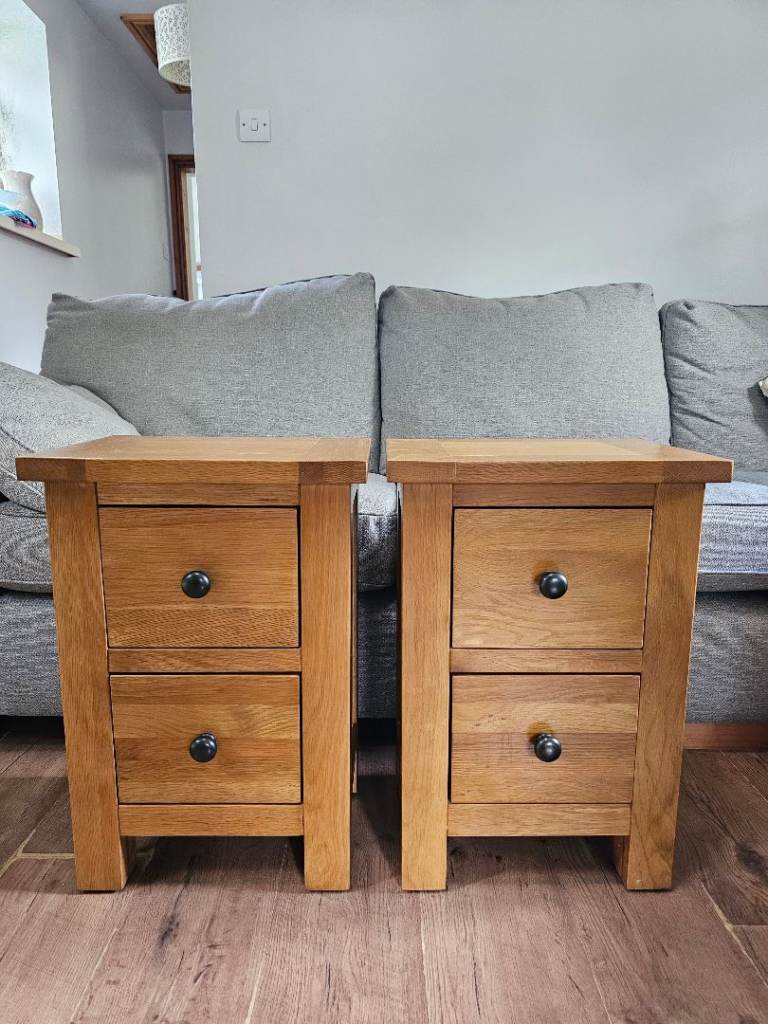Two solid oak bedside tables.
