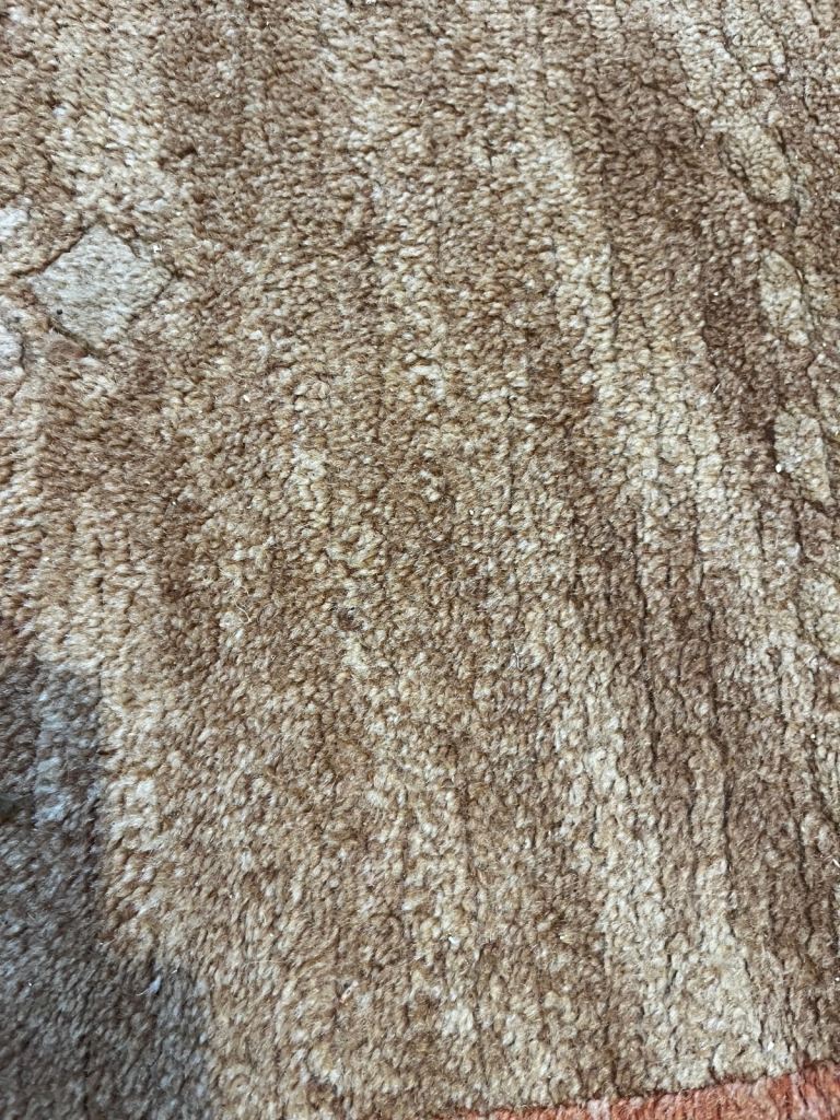 Lovely warm terracotta colours rug Large