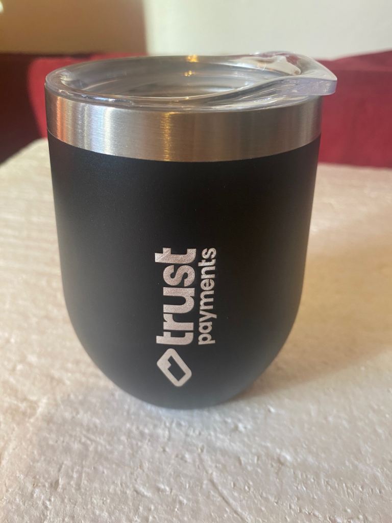 Trust payments stainless steel cup . 