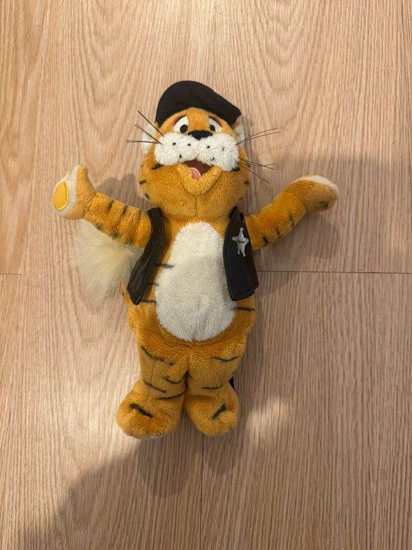 rory the tiger plush – haven holidays mascot wearing black sheriff outfit