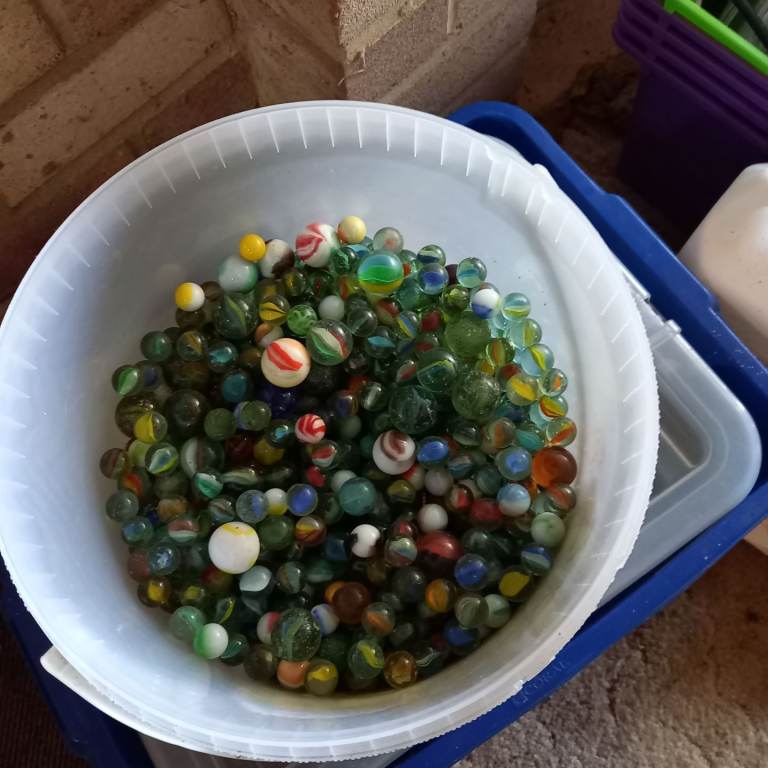 Large tub of assorted marbles