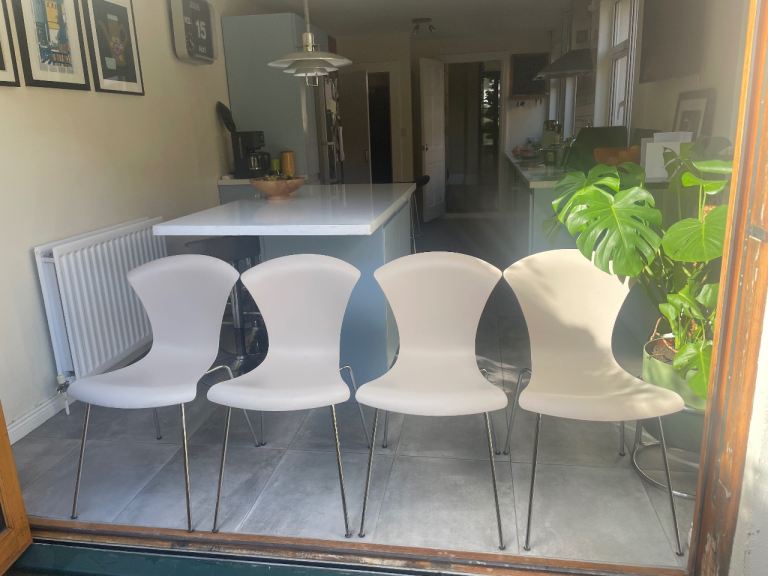 Four Kartell Chairs