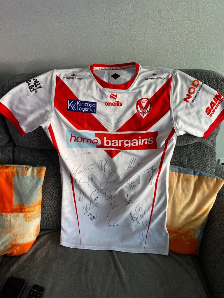 St.Helens signed rugby league shirt.