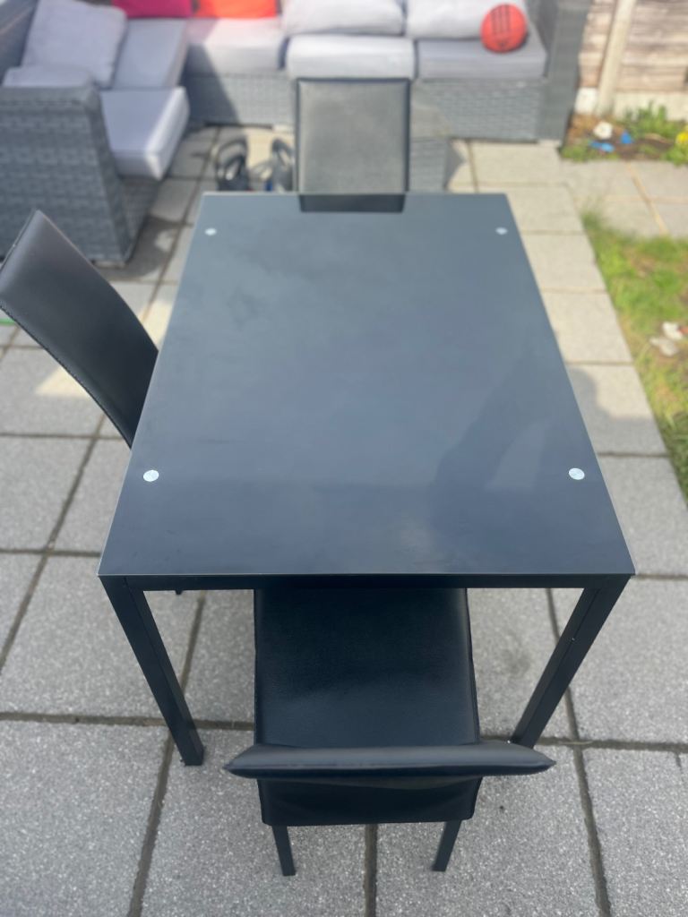 Black glass dining table with matching chairs DELIVERY AVAILABLE!🚚✅