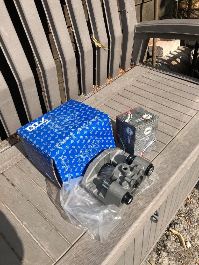New brake caliper with new ABS brake pads 