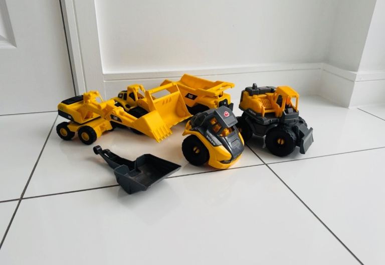 CAT and Volvo Construction Toy Vehicles with Accessories
