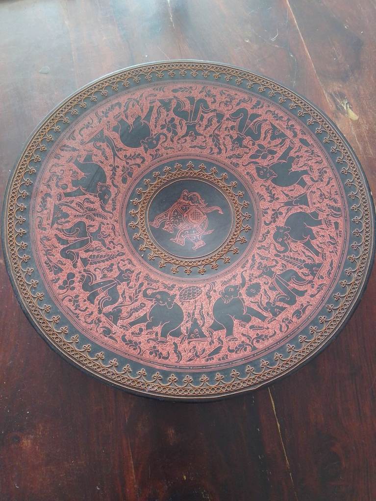 Antique Burmese lacquer plate, embossed 