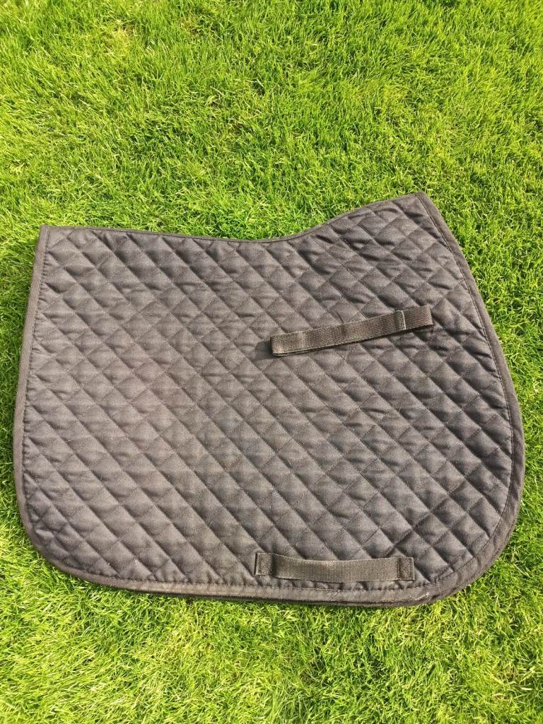 As new condition - black quilted saddle pad