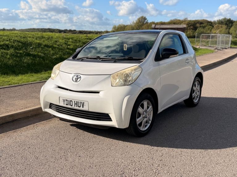 Toyota IQ 1.0. Cheap small car. £20 a year tax 