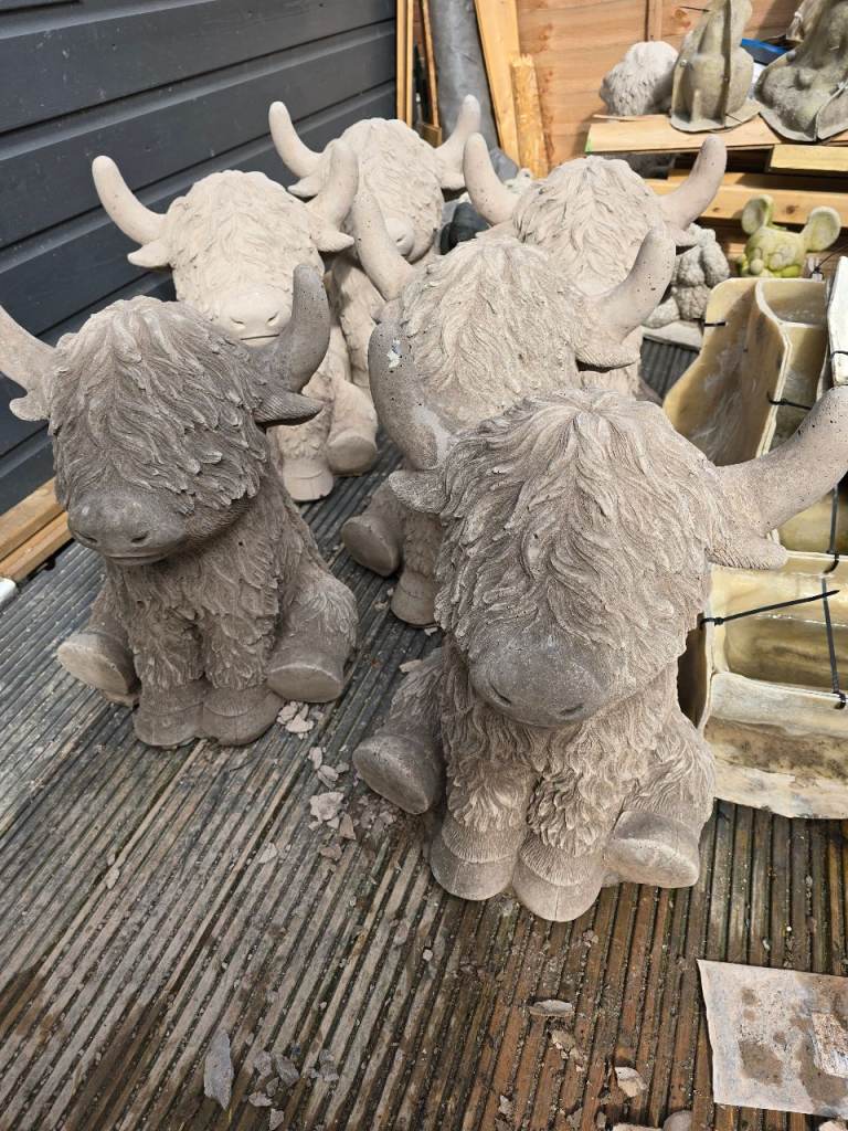 Concrete garden statues off 2 feet highland cows £40 each