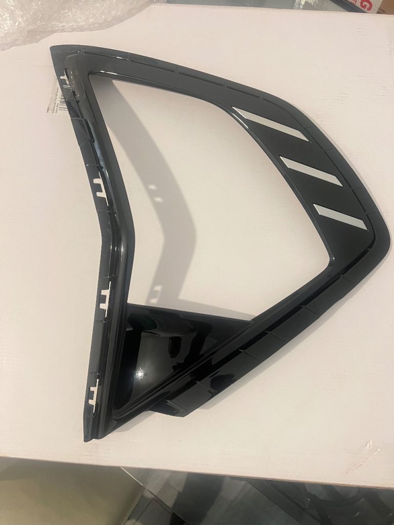 Omoda 5 electric headlight bumper trim, left side