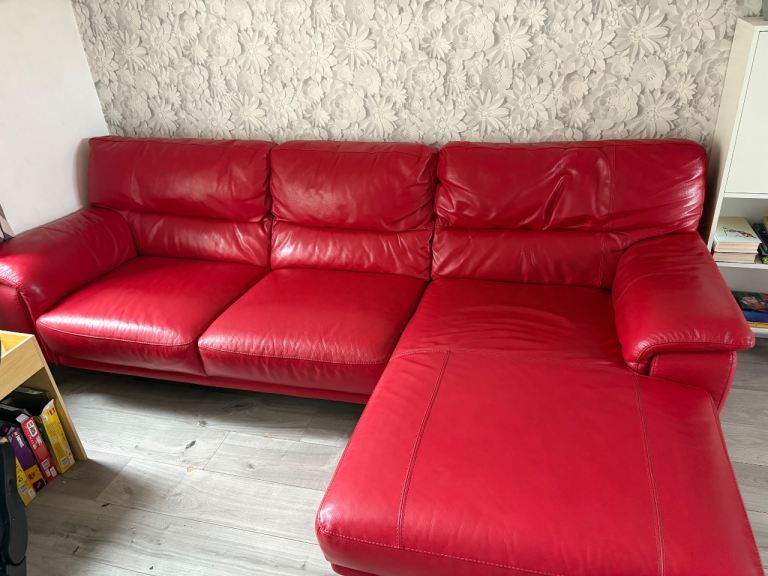Corner red leather sofa
