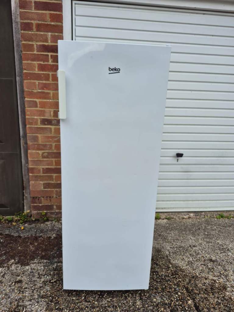 tall freezer available free home delivery 