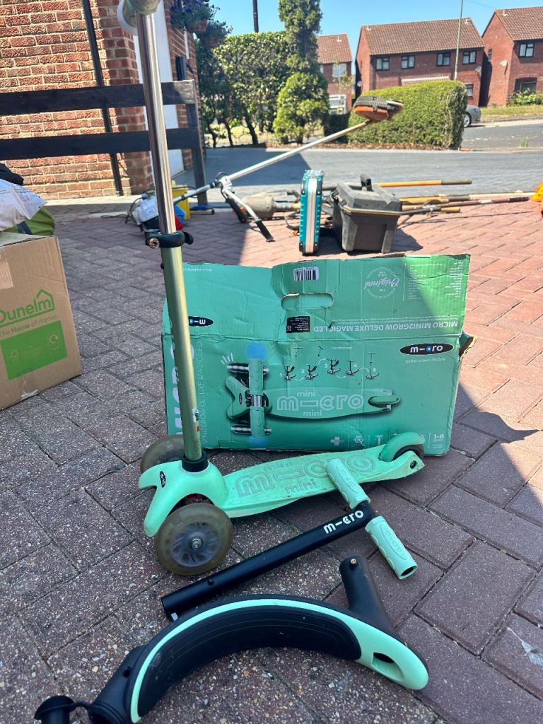 Green micro scooter 