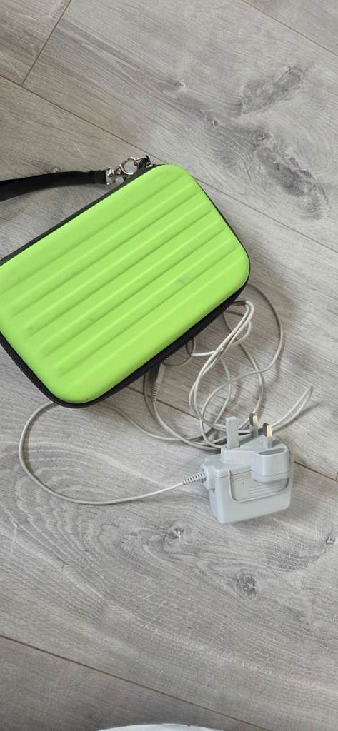 Nintendo 3DS XL with charger, case and 6 games