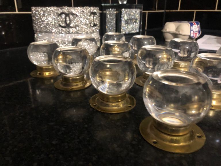 Glass and brass knobs x 12