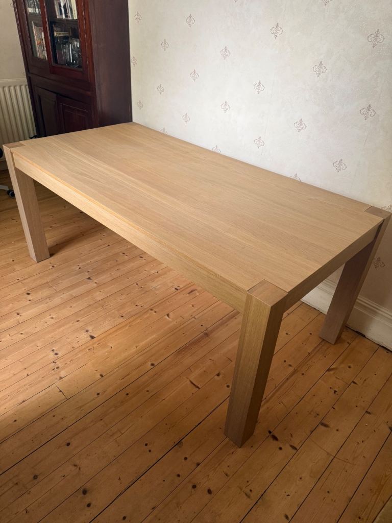 Solid Wood Dining Table – Good Condition