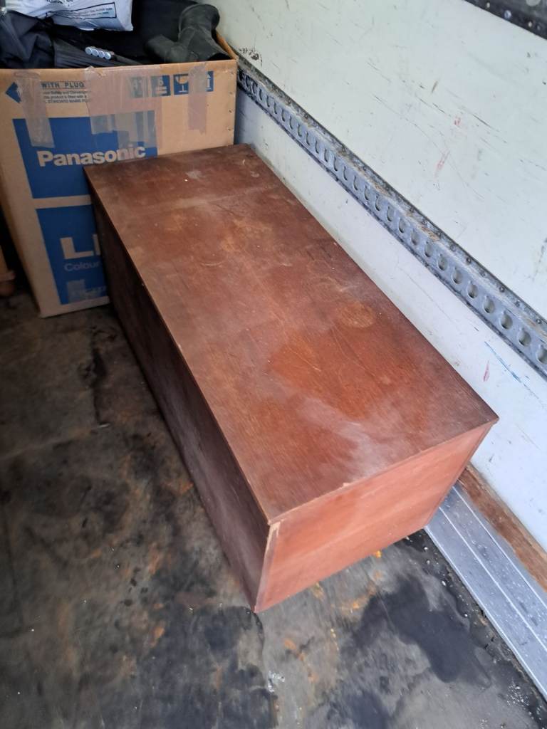 long brown wood blanket box or toy box