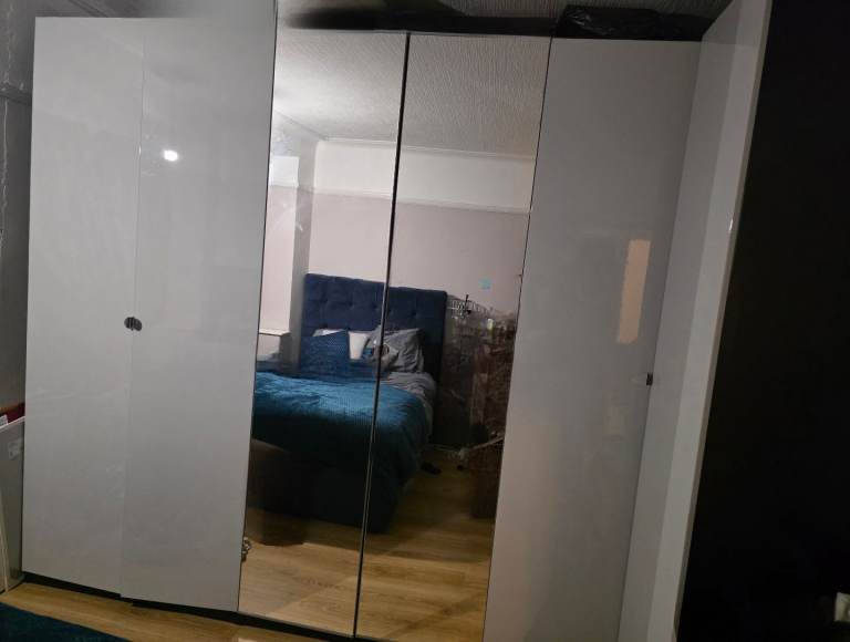 3 Large Ikea wardrobes - 2 double, 1 corner, hieght 237cm, very good condition £550 ono
