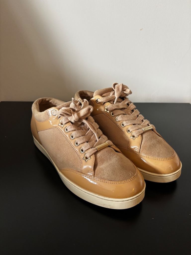 Pair of Jimmy Choo Miami trainers in brown