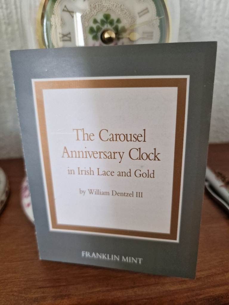 Franklin mint Irish lace and gold carousel clock